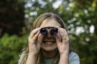 Child with binoculars