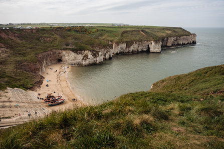 A photograph of North Landing beach from the top of Flamborough Cliffs.