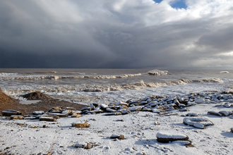 A snowy beach at Spurn national nature reserve