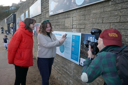 2 members of YWT staff being photographed for the Wild Eye project