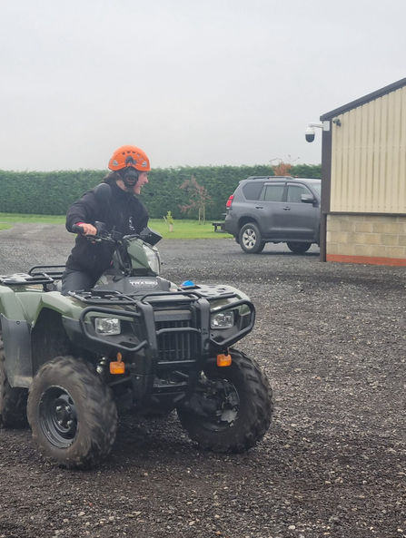 Trainee Savannah driving an ATV